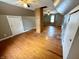 Spacious bonus room with hardwood floors and ceiling fan at 710 Bacon St, Indianapolis, IN 46227