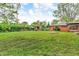 Wide backyard with patio, shed, and lawn at 7380 N State Road 267, Brownsburg, IN 46112