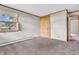 Bedroom featuring carpeting, a window, and a wooden wardrobe at 7380 N State Road 267, Brownsburg, IN 46112