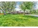 Charming brick home with mature shade trees and expansive front lawn at 7380 N State Road 267, Brownsburg, IN 46112