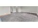 Spacious living area with new carpet and neutral walls offers a versatile space at 7380 N State Road 267, Brownsburg, IN 46112