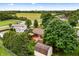 A beautiful aerial view of the home with a deck, shed, and gazebo in a lush yard at 7426 N Carroll Rd, Indianapolis, IN 46236