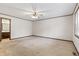A bedroom features neutral colors and carpet flooring at 7426 N Carroll Rd, Indianapolis, IN 46236