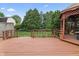 Wooden deck area with well-maintained backyard and a gazebo, perfect for outdoor entertaining and relaxation at 7426 N Carroll Rd, Indianapolis, IN 46236