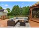 Outdoor deck area featuring comfortable seating around a cozy fire pit, next to a charming gazebo at 7426 N Carroll Rd, Indianapolis, IN 46236