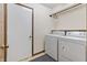 A practical laundry room with a washer and dryer at 7426 N Carroll Rd, Indianapolis, IN 46236