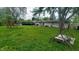 Spacious backyard featuring a swing set and room for outdoor activities, ideal for Gathering enjoyment and recreation at 7435 E 50Th St, Indianapolis, IN 46226