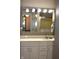 Bathroom featuring white vanity with mirror and lights above, offering a functional and bright space at 7443 Country Brook Dr, Indianapolis, IN 46260