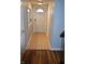 Inviting hallway featuring a tile floor, a front door, and a mirror at 7443 Country Brook Dr, Indianapolis, IN 46260