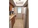 Functional kitchen with classic appliances, tile floors, and ample cabinet space at 7443 Country Brook Dr, Indianapolis, IN 46260