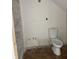 Plumbing for a new toilet in the bathroom with marble shower tiles at 830 Villa Ave, Indianapolis, IN 46203