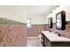Well-lit bathroom featuring double sinks with modern fixtures and coordinated tile work at 8331 Tequista Ct, Indianapolis, IN 46236