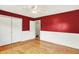 Cozy bedroom with hardwood floors, closet, and a ceiling fan at 8331 Tequista Ct, Indianapolis, IN 46236