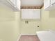 Functional laundry room with ample cabinet space and utility connections at 8331 Tequista Ct, Indianapolis, IN 46236