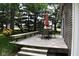 Backyard deck features outdoor seating perfect for al fresco dining and relaxing outdoors at 8373 W State Road 47, Thorntown, IN 46071