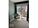Bedroom featuring sliding glass door, carpet, and neutral walls at 8373 W State Road 47, Thorntown, IN 46071