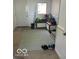 Mudroom featuring built-in storage bench, an accent rug, and a window for natural lighting at 8373 W State Road 47, Thorntown, IN 46071