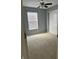 Bedroom featuring neutral walls and carpet with a window for natural light at 842 Westpointe Dr, Shelbyville, IN 46176