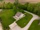 Picturesque property featuring a charming home with well-manicured lawn and a serene driveway at 8468 S County Road 575 E, Mooresville, IN 46158
