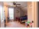 Cozy bedroom features natural light, a ceiling fan and a cute design with a red and blue comforter at 8468 S County Road 575 E, Mooresville, IN 46158