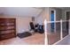 Bonus room featuring carpeted floors, natural light, and a view of the upstairs bathroom at 8468 S County Road 575 E, Mooresville, IN 46158