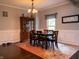 Traditional dining room featuring a dark wood dining table set and stylish decor at 8468 S County Road 575 E, Mooresville, IN 46158