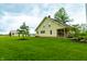 Attractive home with a well-maintained lawn, charming porch, and serene atmosphere at 8468 S County Road 575 E, Mooresville, IN 46158