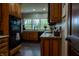 Beautiful kitchen featuring wood cabinets, granite countertops, modern appliances and lots of natural light at 8468 S County Road 575 E, Mooresville, IN 46158