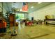 Spacious workshop interior featuring an open layout, American flag, and ample work space at 8468 S County Road 575 E, Mooresville, IN 46158