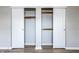 Bedroom closet features double doors and shelving for optimal storage space at 912 Delray Dr, Indianapolis, IN 46241