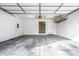 Clean and spacious two-car garage with a white door, ready for customization at 912 Delray Dr, Indianapolis, IN 46241
