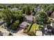 Aerial view of a property and backyard surrounded by mature trees in a quiet residential neighborhood at 920 E Tabor St, Indianapolis, IN 46203