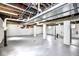 Unfinished basement with painted walls and floor offers a blank canvas for future customization at 920 E Tabor St, Indianapolis, IN 46203