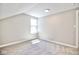 Bedroom featuring neutral carpet and a window providing ample sunlight at 920 E Tabor St, Indianapolis, IN 46203