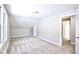 Empty bedroom with carpet, a window, and a doorway into another room at 920 E Tabor St, Indianapolis, IN 46203
