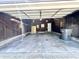 An empty garage with concrete floors and wooden walls, perfect for customization and ample storage space at 920 E Tabor St, Indianapolis, IN 46203