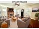 Virtually staged living room featuring a fireplace, wood floors, neutral paint, and recessed lighting at 920 E Tabor St, Indianapolis, IN 46203