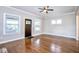 Open living room features hardwood floors, natural light, and neutral paint at 920 E Tabor St, Indianapolis, IN 46203