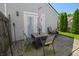 Patio area featuring a table with chairs and backyard view at 9774 Foxboro Ln, Fishers, IN 46038