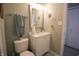 Bright bathroom with a white vanity, decor, and stylish mirror at 9774 Foxboro Ln, Fishers, IN 46038