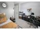 Bedroom featuring neutral paint, a comfortable bed, and a desk area at 9774 Foxboro Ln, Fishers, IN 46038