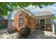 Charming single Gathering home with brick facade, attached garage, and well-maintained front yard at 9774 Foxboro Ln, Fishers, IN 46038