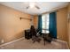 Bedroom features a ceiling fan, a black desk, and a window with curtains at 11720 S County Road 396 E, Muncie, IN 47302
