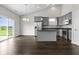 Modern kitchen with stainless steel appliances and a kitchen island at 11815 Adair Pl, Indianapolis, IN 46229
