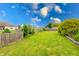 Spacious backyard with lush green grass and manicured landscaping, offering a serene outdoor space at 1199 Oak Leaf Rd, Franklin, IN 46131