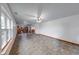 Large basement with neutral tile flooring, and access to the kitchen at 1199 Oak Leaf Rd, Franklin, IN 46131