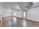 Expansive basement area with tile flooring and a walk-out door at 1199 Oak Leaf Rd, Franklin, IN 46131