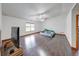 Large bedroom with vaulted ceiling, ceiling fan, and dark wood floors at 1199 Oak Leaf Rd, Franklin, IN 46131