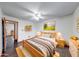 Cozy bedroom boasts natural light, neutral decor, and comfortable furnishings at 1199 Oak Leaf Rd, Franklin, IN 46131