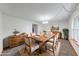 Inviting dining room featuring a wooden table, seating for eight, and decor at 1199 Oak Leaf Rd, Franklin, IN 46131